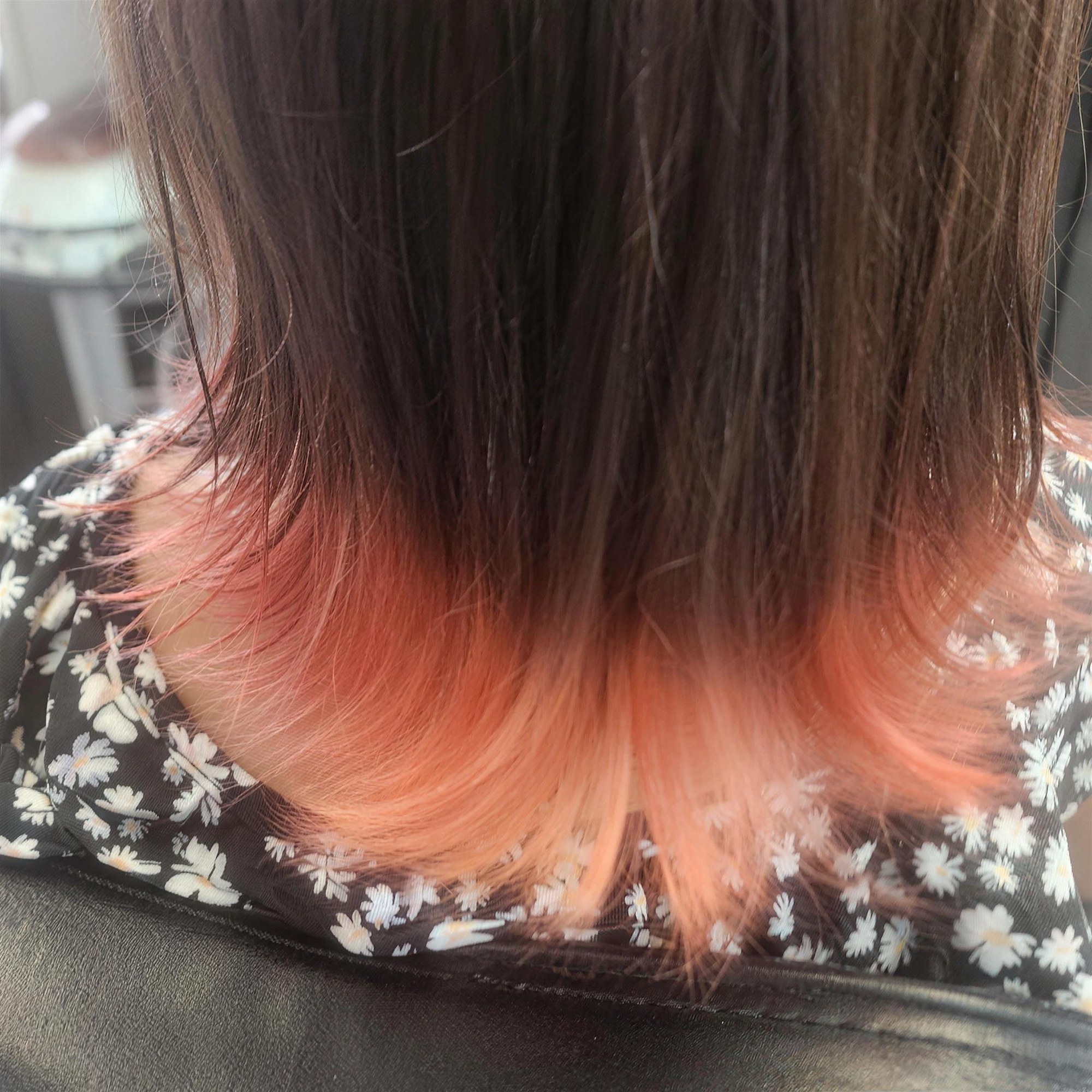 Coral underlights on brunette
